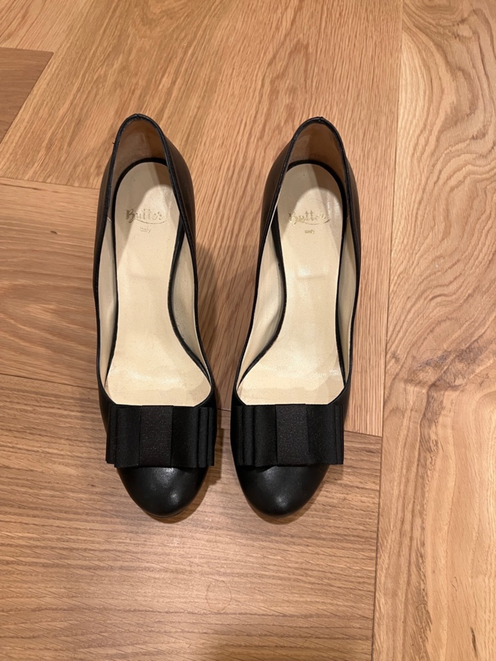 Butter Black Leather Pumps with Front Bow Accent